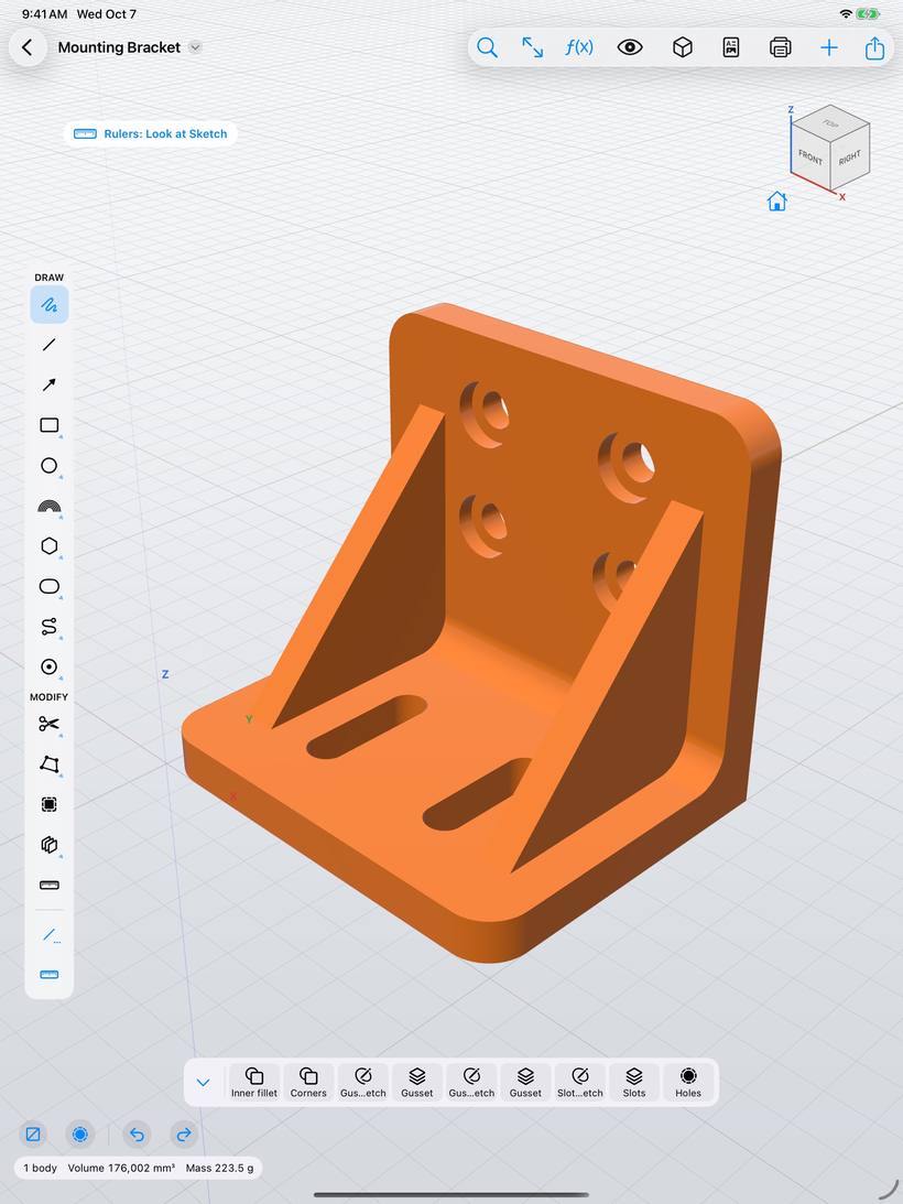 Mounting bracket with ribs and slots